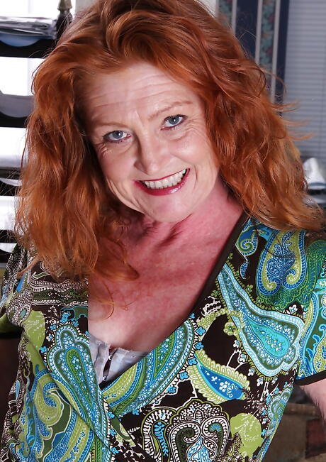 Very attractive british redheaded older Veronica Smith denudes big knockers and masturbates 